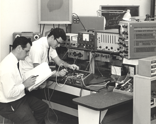 Universal Audio engineers bench testing the original 1176 Limiting Amplifier, circa 1967. UA still hand-builds every 1176 in Scotts Valley, CA