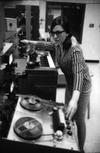 Norma Beecroft in the University of Toronto Electronic Music Studio (UTEMS) in 1967, mixing while manipulating the Ampex 352 ¼